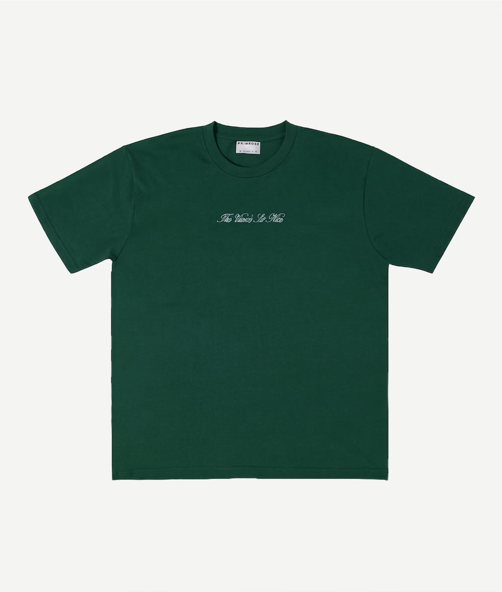 Green t-shirt with white text on a white background