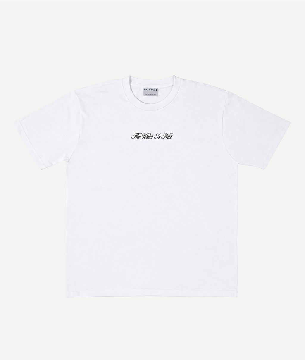 White t-shirt with black text on a white background